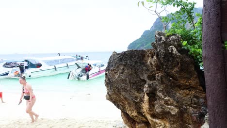 tourists enjoy the beach and scenic views