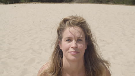 beautiful woman raising head while coming out of yoga pose