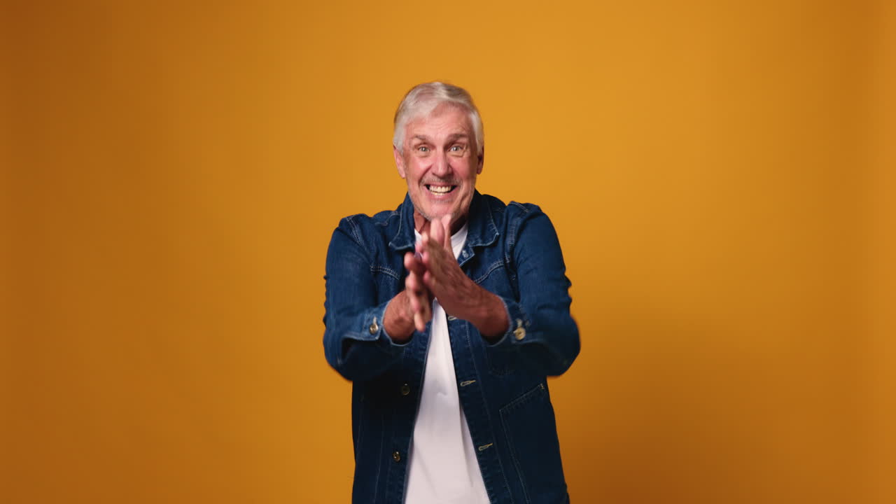 Excited Middle-Aged Man Celebrating Success