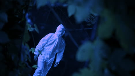 mysterious figure in night forest