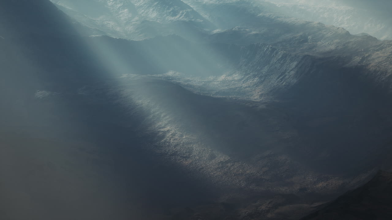 Alpine chains shrouded in the morning fog