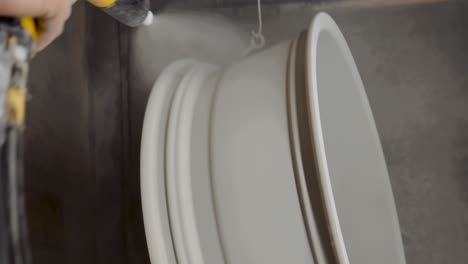 rotating wheel and applying powdercoat primer to the outside of the rim, in 4k.