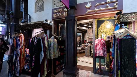 vibrant textiles and garments displayed in dubai shop