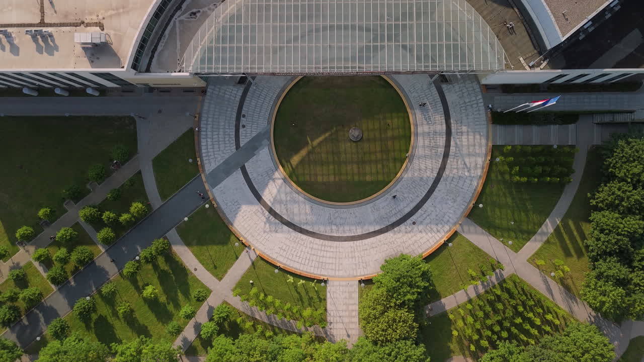 Aerial View of a Modern Campus Building with a Circular Plaza