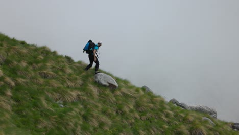 backpacker running downhill off the beaten path, active freedom