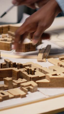 vertical video close up of engineers team creating the property layout for site preparation