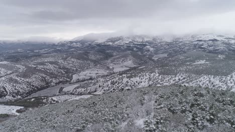 snowy mountain valley aerial view