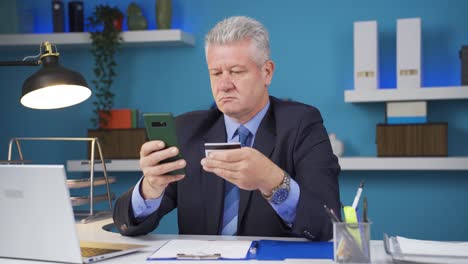 Businessman-shopping-on-the-phone.