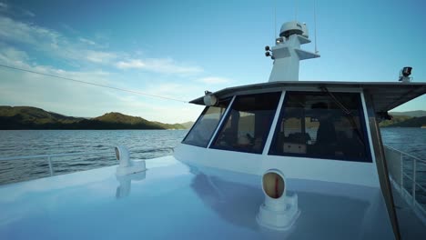 slowmo - cabin cruiser boat in marlbourough sounds, new zealand during evening