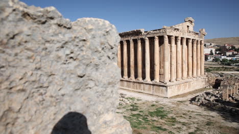 Baalbeck-Castle-is-revealed-behind-a-rock