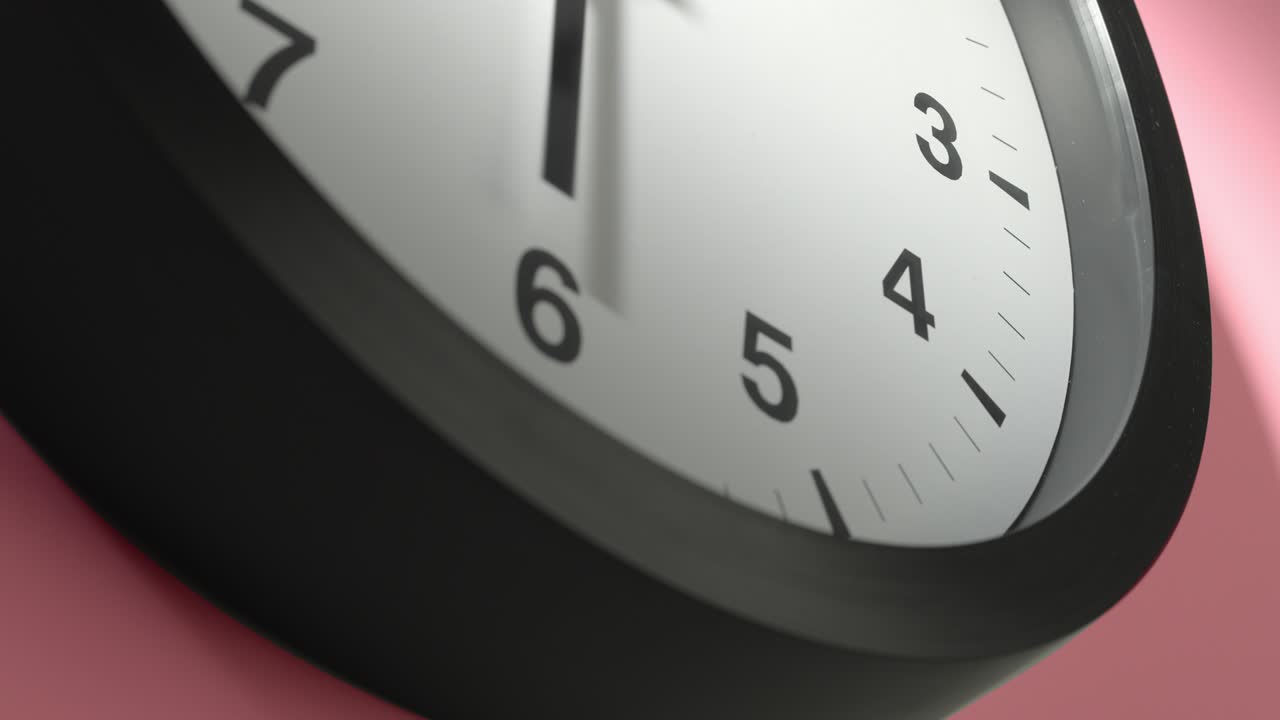 Clock Face on Rosy Rose Pink Wall in Time Lapse