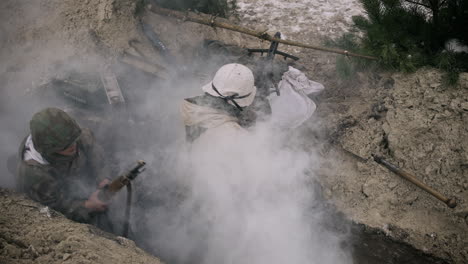 soldiers in a trench during winter warfare