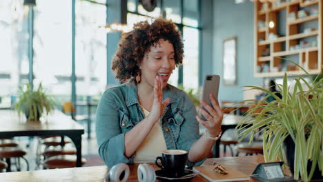 Video-call,-coffee-shop-and-woman-with-phone