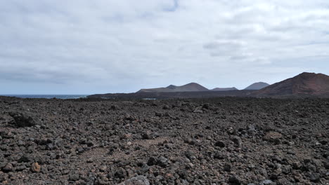 black lava landscape on cloudy day