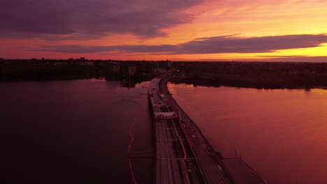 aerial sunset over bridge under construction