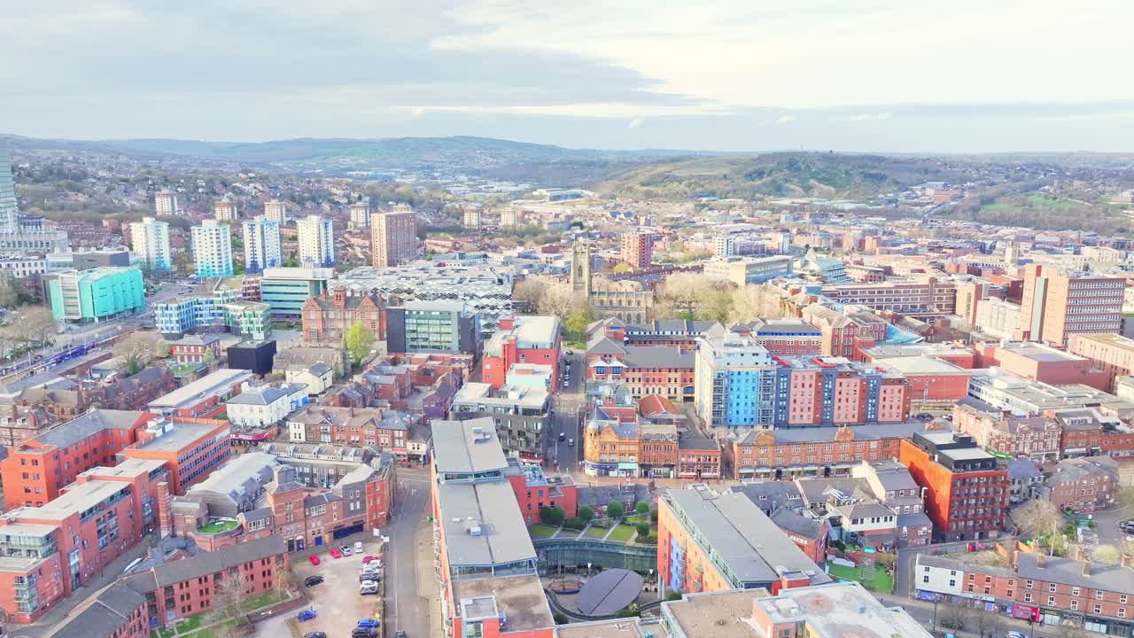 Aerial establishing fly Sheffield city in United Kingdom, city buildings, streets, skyline background at Devonshire Green Area