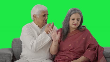 Guilty-Old-Indian-husband-apologizing-to-his-wife-Green-screen