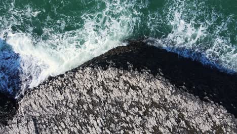 Rock-formations-next-to-big-waves-on-Black-Sea-Region-at-Turkey---Aerial-Ascending-Shot