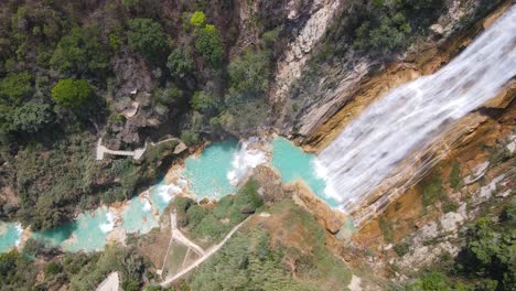 aerial: el chiflon waterfall cascading down mountain in chiapas mexico, top down