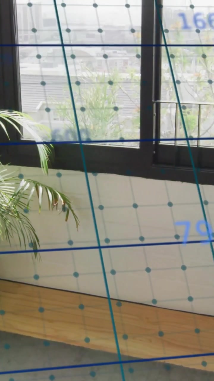 Vertical video: Cam panning up AR grid shifting over window while numbers sliding, labeling panes