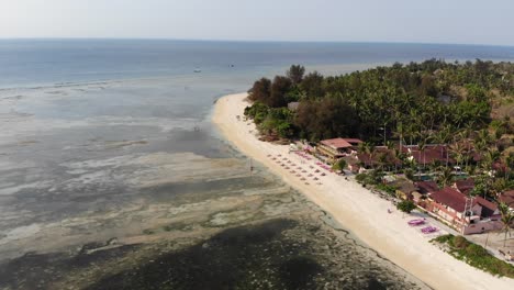 Drone-shot-of-Gili-Air-island,-Indonesia,-on-a-hot,-sunny-day