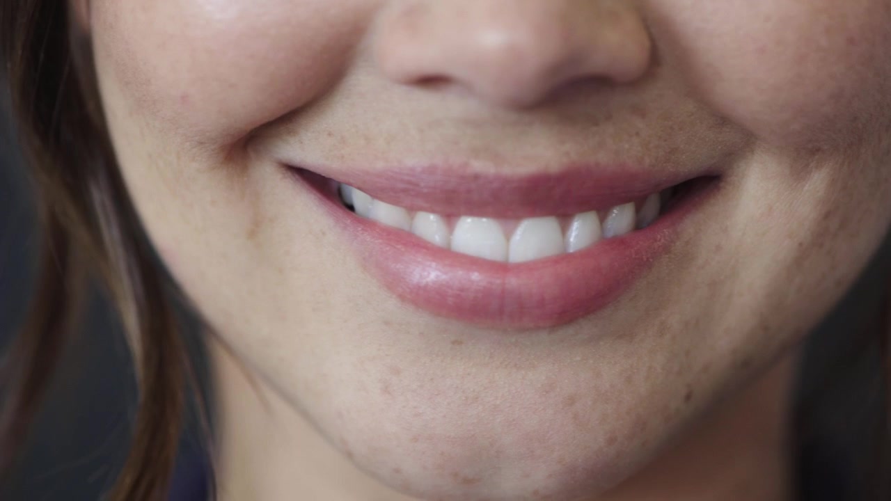 Close-up of a Young Woman Smiling