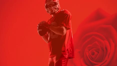 Animation-of-american-football-player-holding-ball-over-red-rose-background