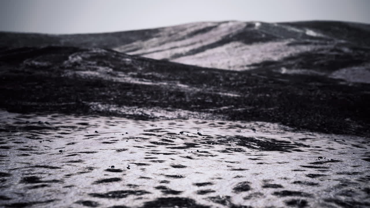 Lava field in a remote volcanic region exhibits unique textures and formations