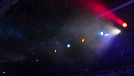 multicolored spotlight of scene lights in the dark