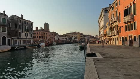 fpv of fondamenta cannaregio and venetian canal, venice in italy. slow motion