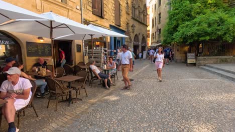 people enjoying a sunny day in sarlat