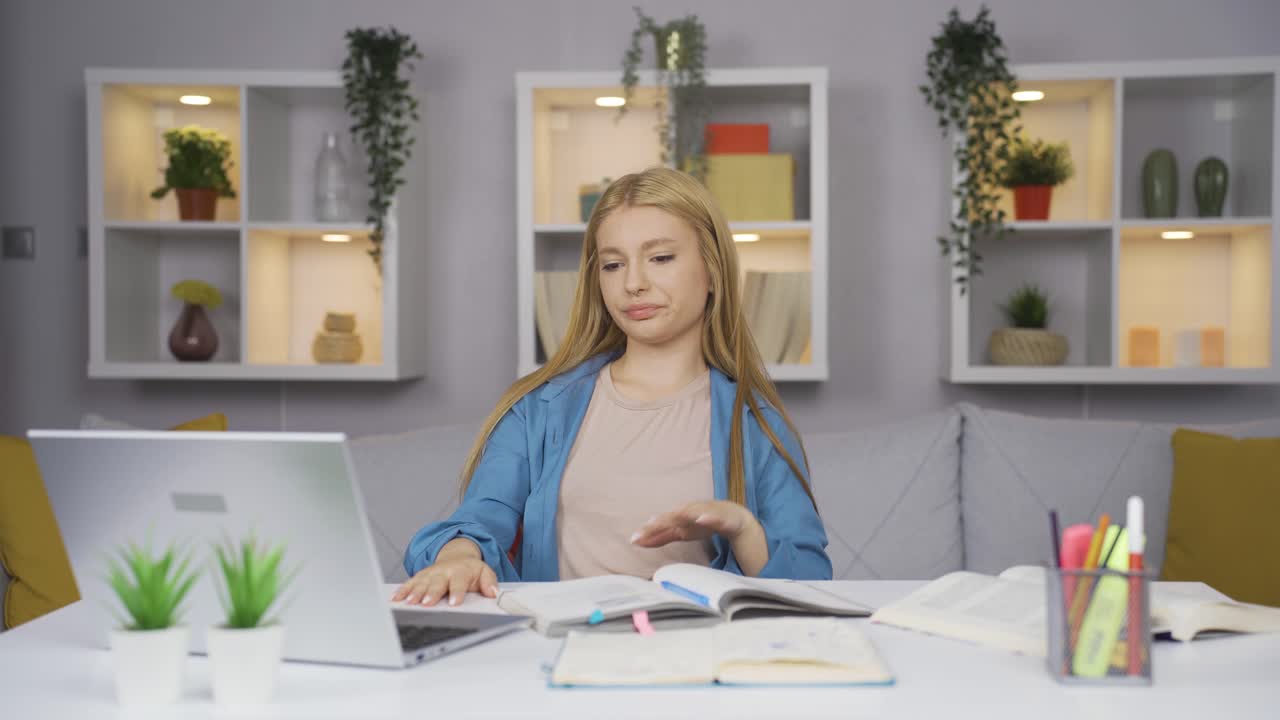 Unhappy Studying Female student.