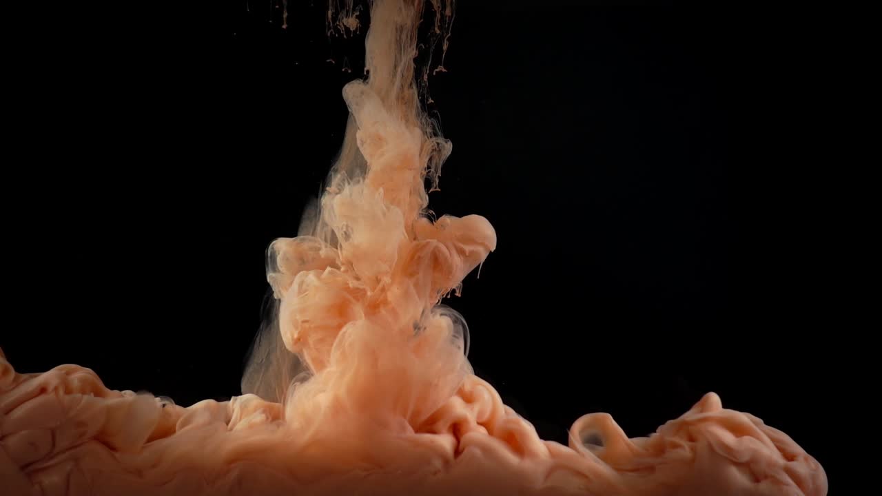 Paints. Abstract forms. Shooting on a black background