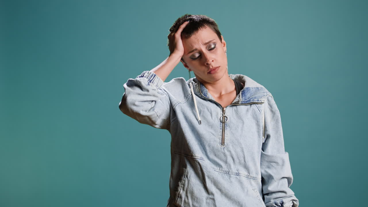 Woman holding a bottle of pills