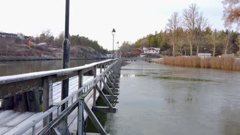 Frost-settles-over-Trollhättan-Canal-on-a-winter-day,-Sweden