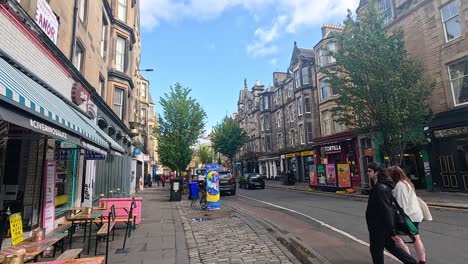 pedestrians and vehicles on a bustling street