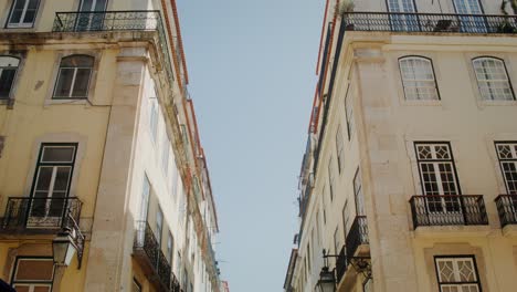 narrow street in lisbon, portugal