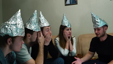 friends wearing foil hats