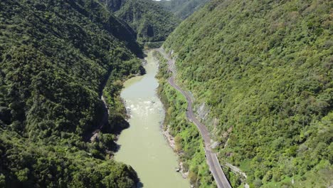 Flying-over-the-abandoned-Manawatu-Gorge-Road,-New-Zealand