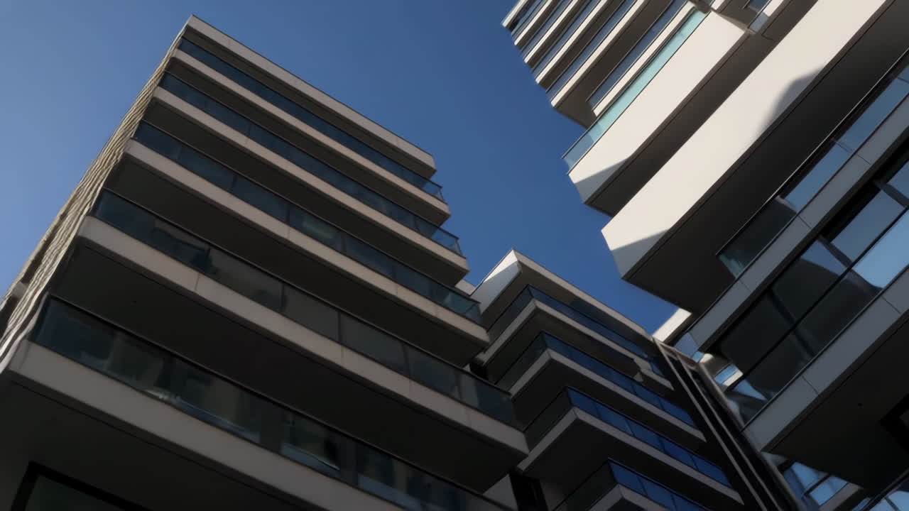 Modern High-Rise Building Against a Clear Blue Sky