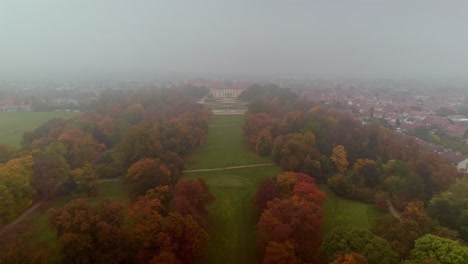 Aerial-Drone-Over-Czechia-Historical-Slavkov-Castle,-Czech-Republic,-On-Misty-Autumn-Day