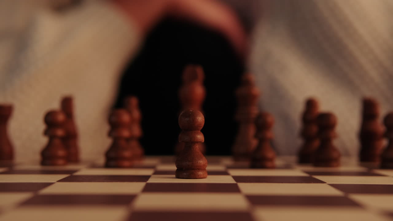 Woman Playing Chess, Moving a Pawn