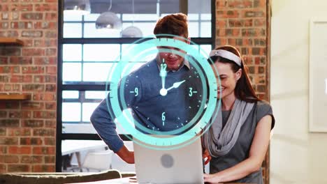 animation of clock ticking over diverse business people using laptop
