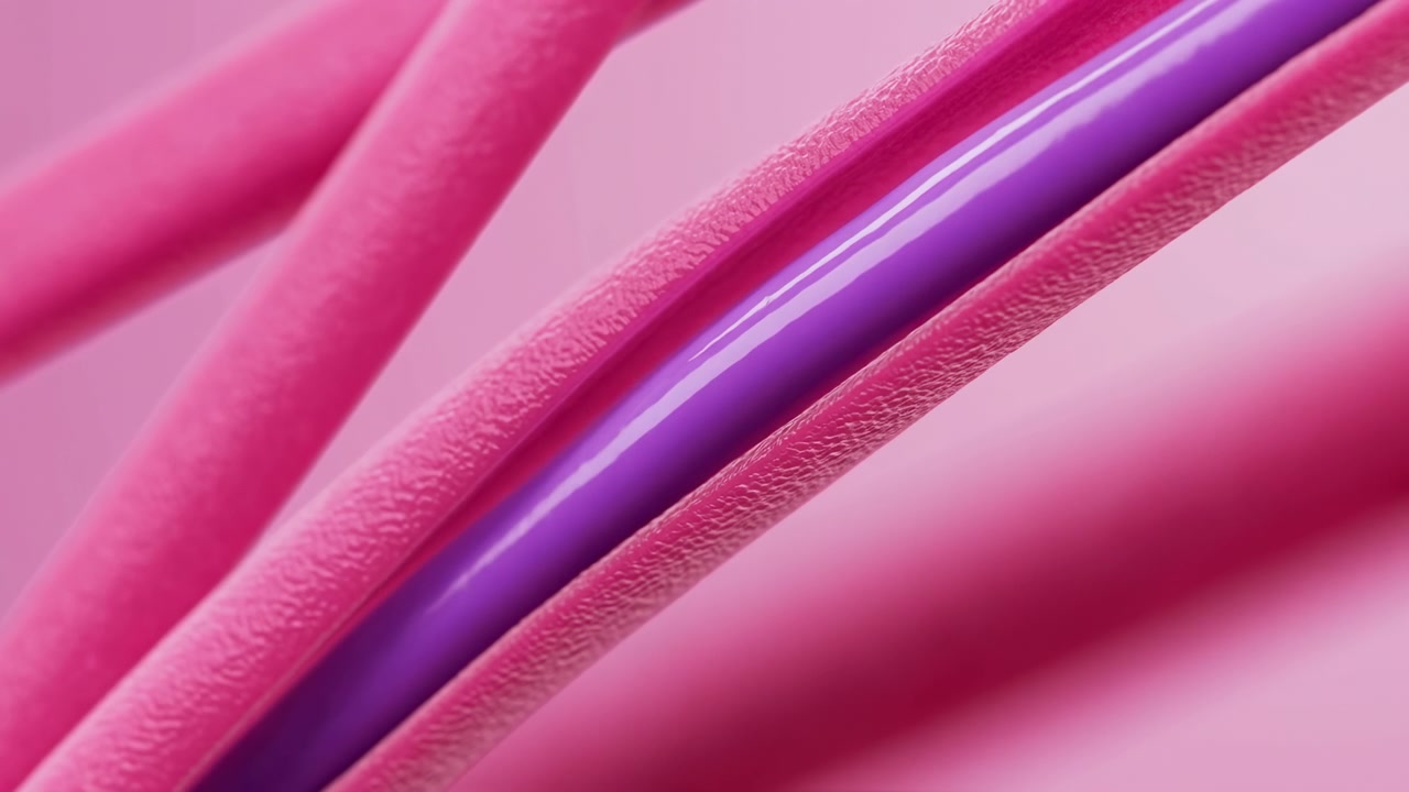 Vue macro très rapprochée montrant des formes tubulaires incurvées se croisant en diagonale, avec un centre violet brillant sur des rubans roses mats, des surfaces texturées et douces.