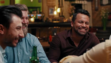 Group-of-friends-enjoying-time-together-in-the-pub