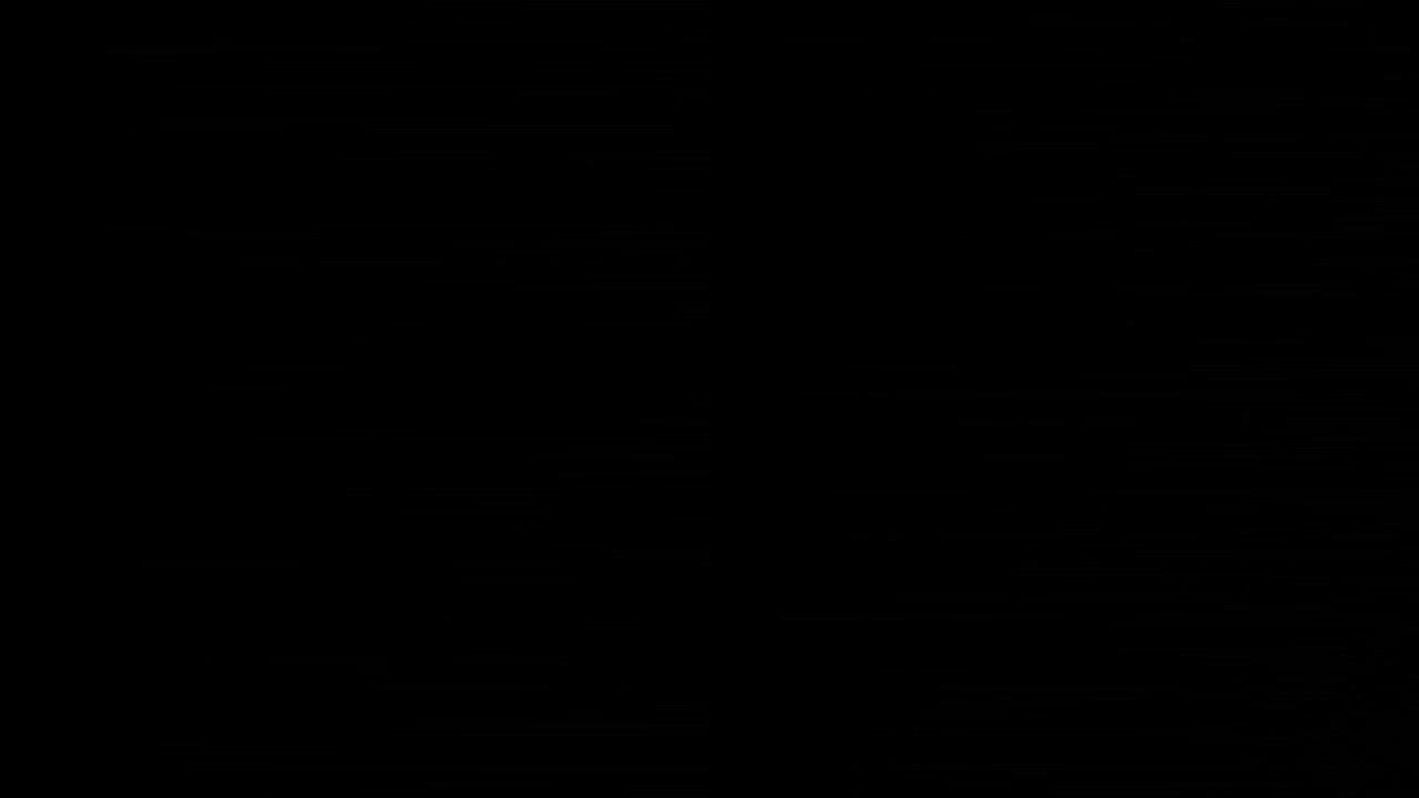 blinking defocused christmas lights in dark background
