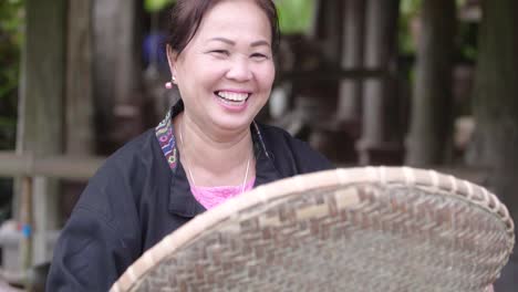 happy woman harvesting rice