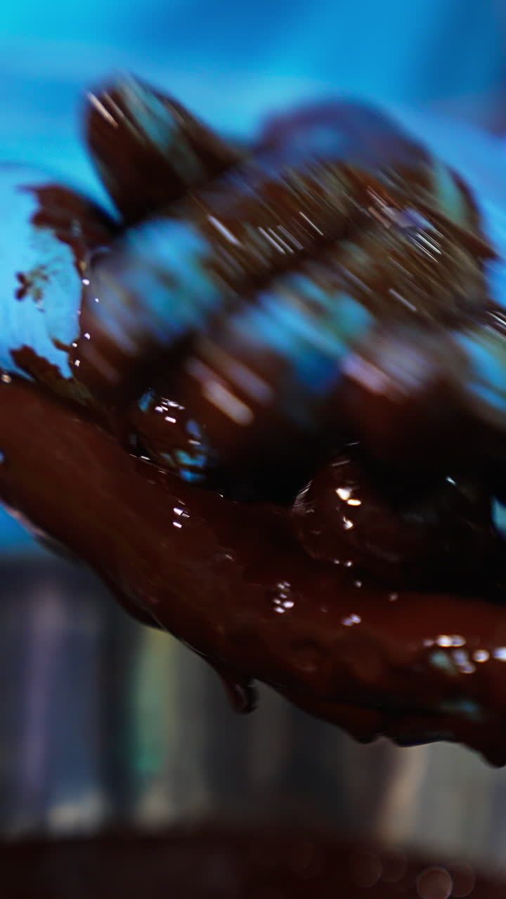 Hands making chocolate