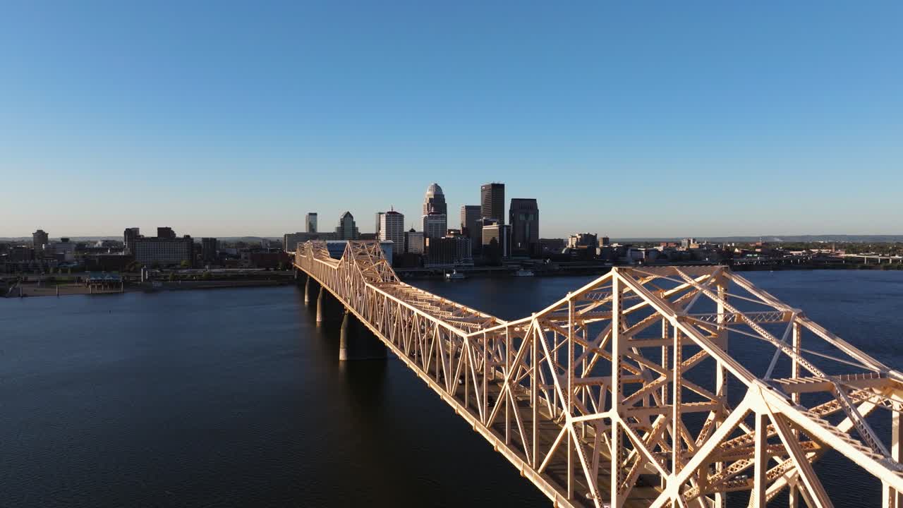 Drone Descends to Reveal Clark Memorial Bridge. Louisville Skyline in Background