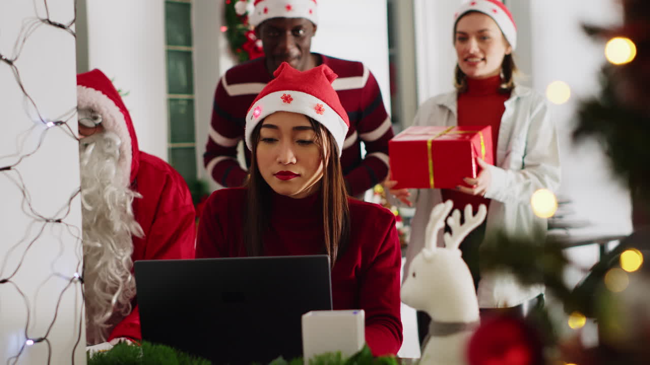 Festive Office Christmas Party with Santa Hats and Gifts